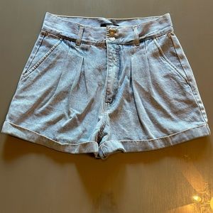 High waisted, light wash denim , pleated shorts